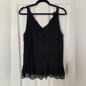 NWT Chicos convertible tank
Black 
Size 2 (12/14)
